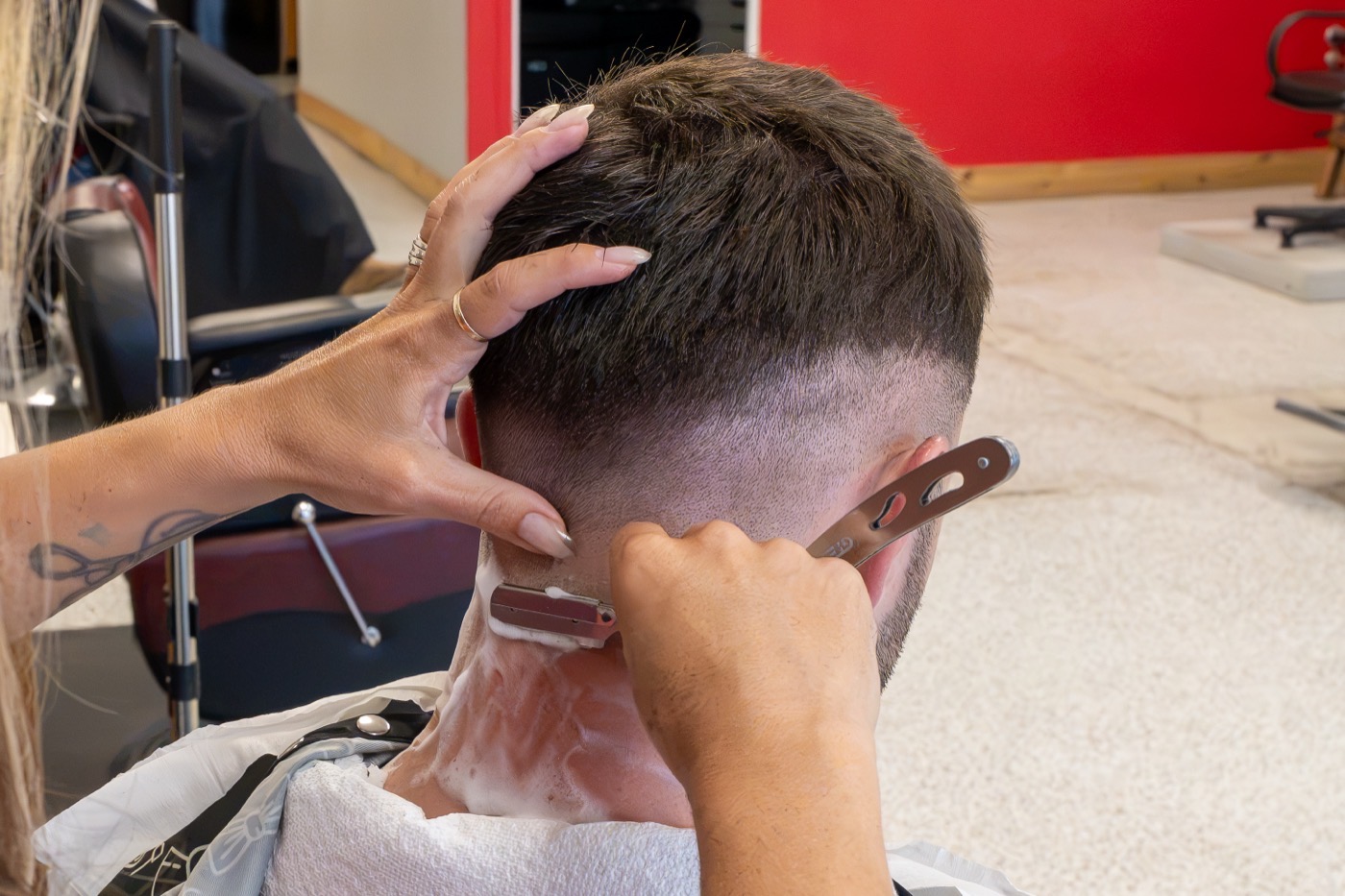 Straight razor neck shave at Beauty and Her Barbershop